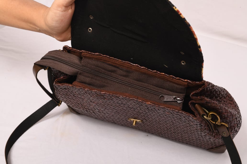 Handbag with fabric flap