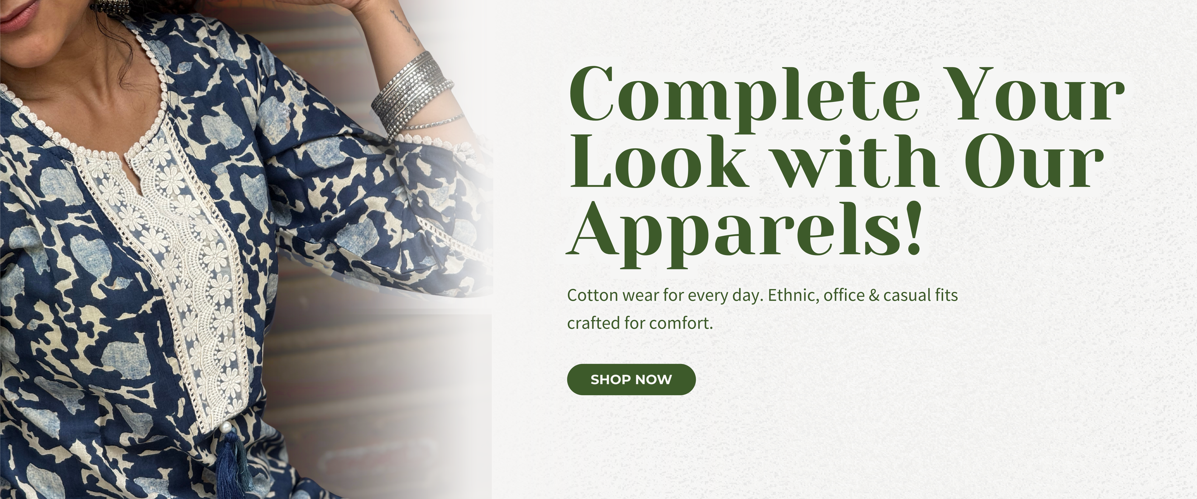 Promotional banner for apparels with a woman wearing a patterned outfit, text encouraging to complete your look with their products.