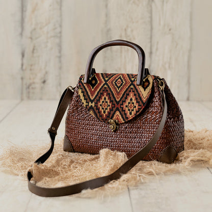 Handbag with fabric flap