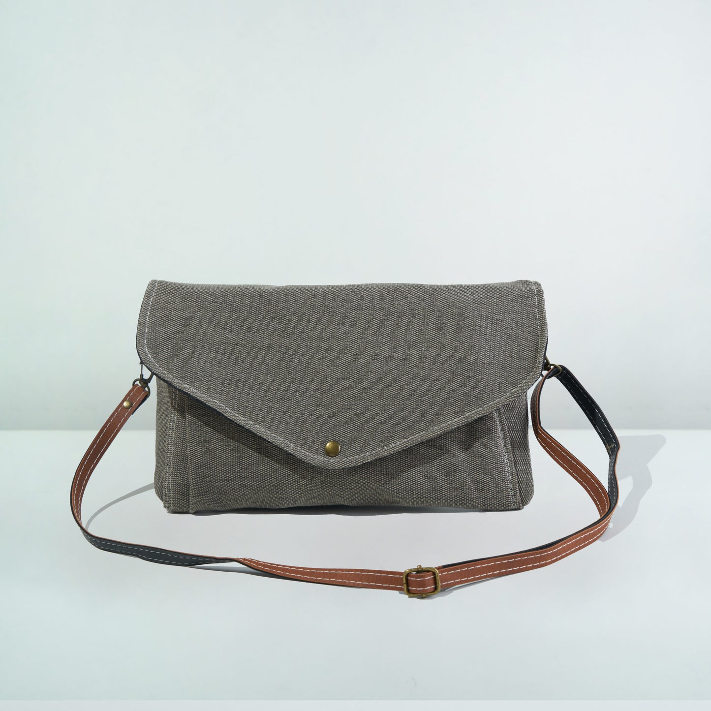 Simply Taupe canvas fabric Sling bag